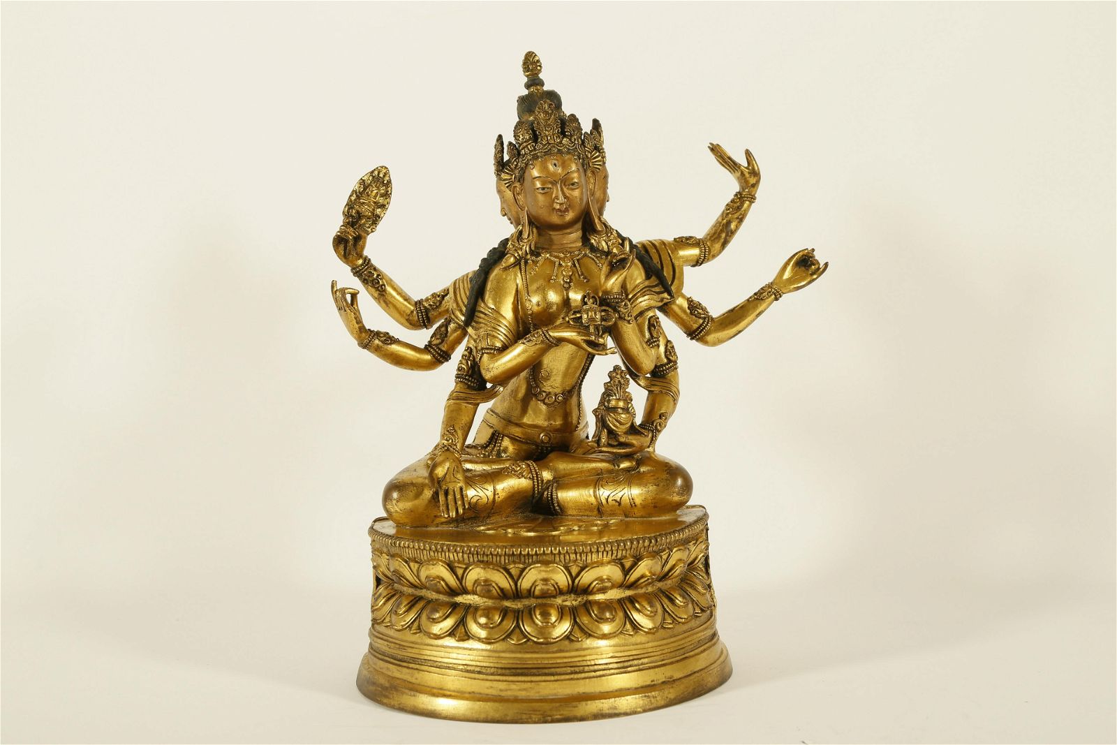 A FINE GILT-BRONZE FIGURE OF
