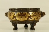 A FINE GOLD-INLAID COPPER 'PHO