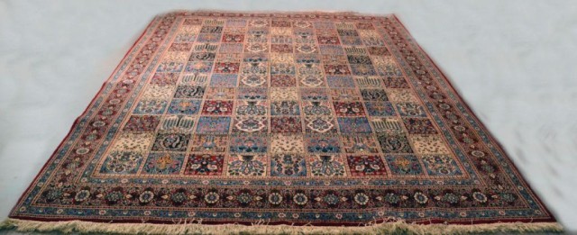 A FINE HAND-MADE WOOL PERSIAN