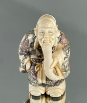 A FINE JAPANESE NETSUKE A HUNC