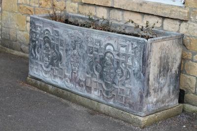 A fine lead water cistern, dated