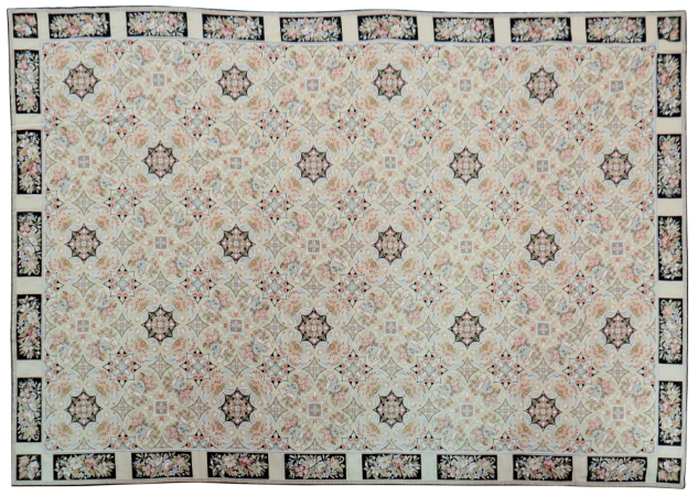A FINE NEEDLEWORK CARPET of 19th