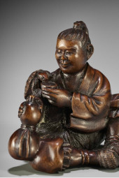 A FINE NETSUKE BY SHOKO SUGANO