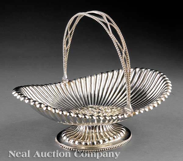 A Fine New Orleans Coin Silver Cake