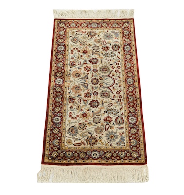 A Fine Silk Carpet Cream ground