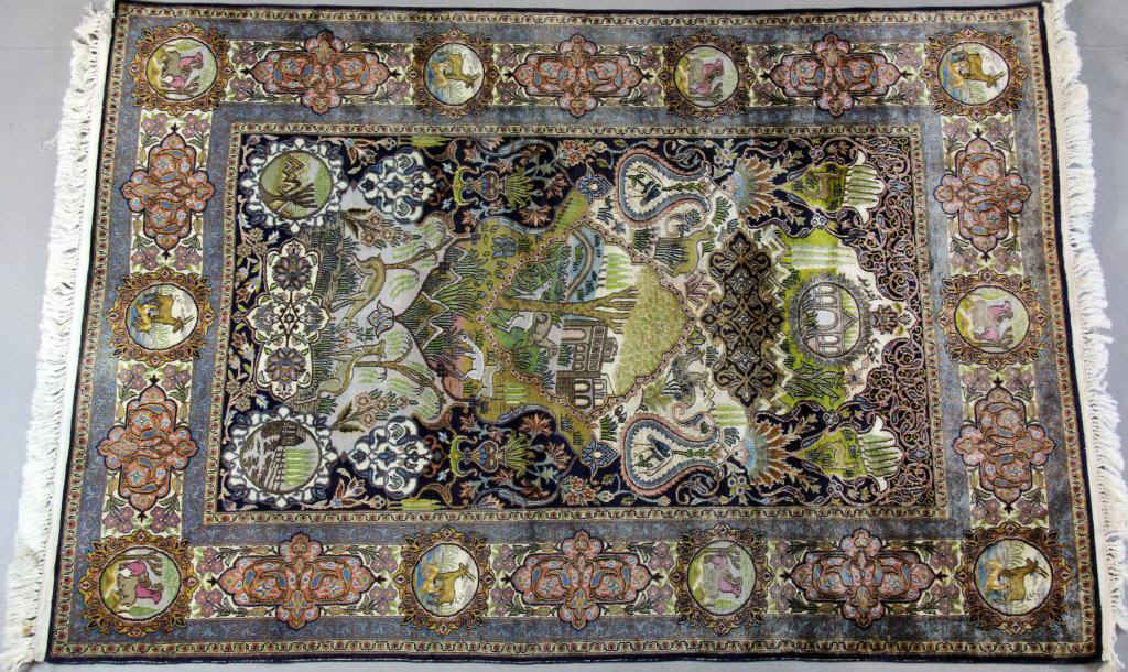 A Fine Silk Persian RugHaving