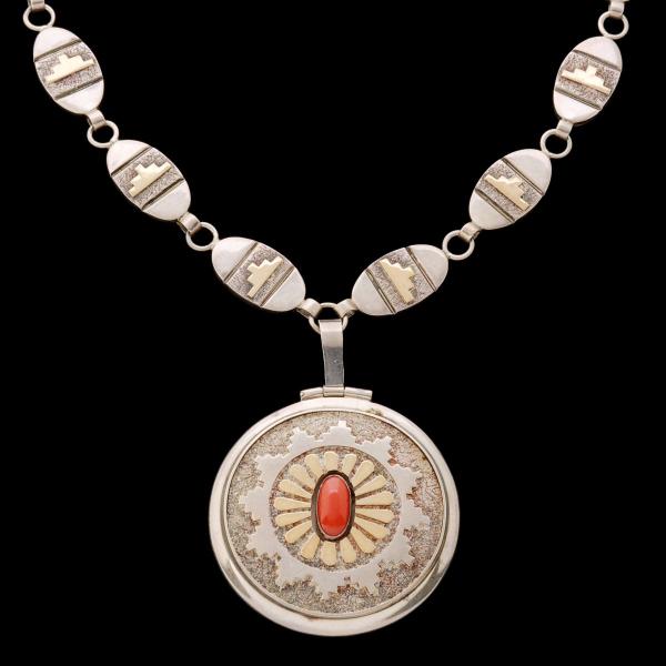 A FINE STERLING, CORAL AND 14K