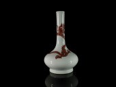 A FINE UNDERGLAZED-RED DRAGON