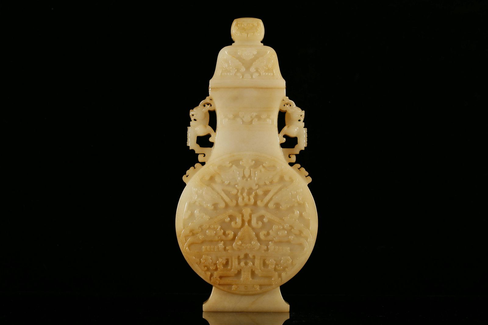 A FINE WHITE JADE DRAGON PATTERN