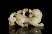 A FINE WHITE JADE 'PARENT-CHIL