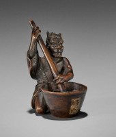 A FINE WOOD NETSUKE BY SHOKO S