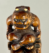 A FINE WOOD NETSUKE OF RAIJIN