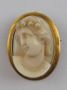 A finely carved ivory cameo set