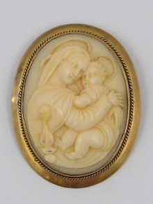 A finely carved ivory cameo