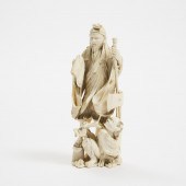 A Finely Carved Ivory Okimono
