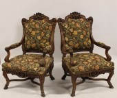A FINELY CARVED PAIR OF ANTIQU