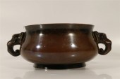 A FINELY-CAST COPPER HANDLE CE