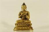 A FINELY-CAST GILT-BRONZE FIGU