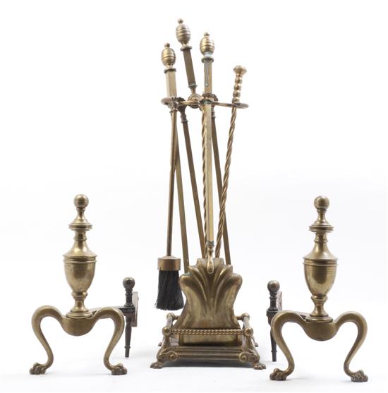 A Fireplace Tool Set On Stand