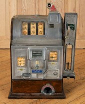 A FIVE CENT ROCK-OLA SLOT MACH