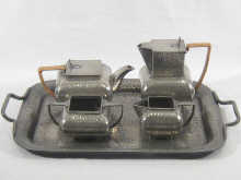 A five piece pewter tea set with