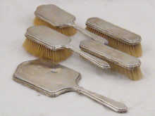 A five piece silver brush set