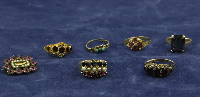 A five-stone garnet ring on a 9ct