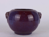 A FLAMBE GLAZED BRUSHWASHER<br