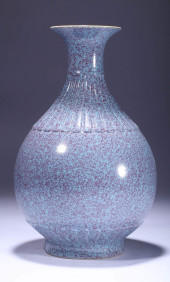 A FLAMBE GLAZED MELON SHAPED V