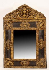 A Flemish style wall mirror wi