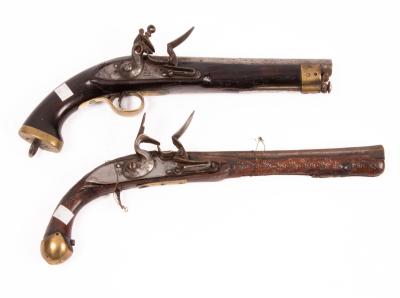 A flintlock pistol with lion