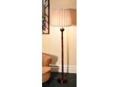 A floor lamp with a turned mah