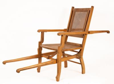 A folding beech carrying chair by