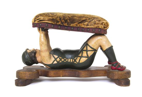 A Folk Art Carved and Polychrome
