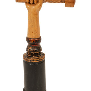 A Folk Art Carved and Polychrome