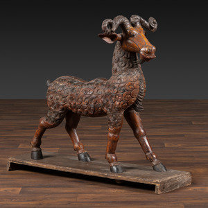 A Folk Art Carved and Painted