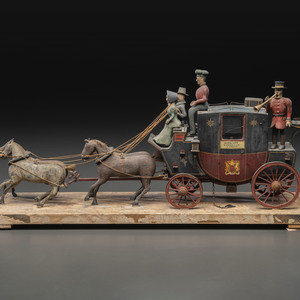 A Folk Art Carved and Painted