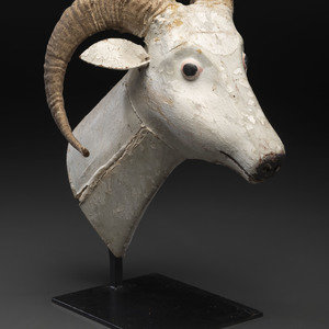A Folk Art Carved and Painted