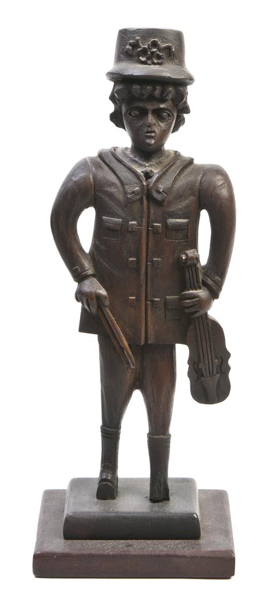 *A Folk Art Carved Wood Figure
