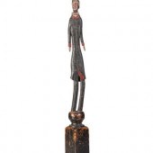 A Folk Art Carved Wood Slender