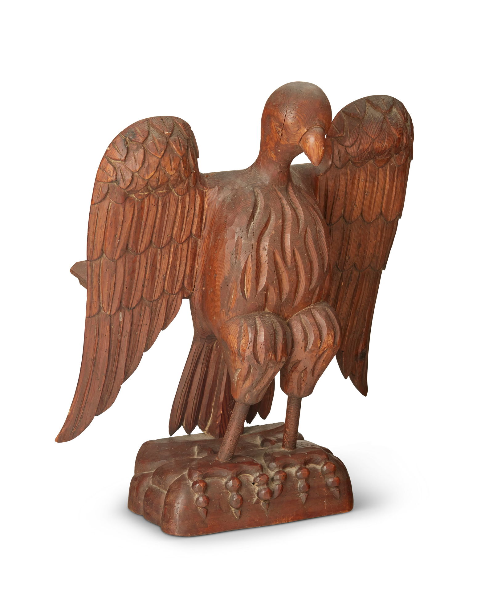 A FOLK ART CARVED WOOD EAGLE