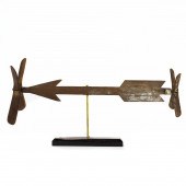 A FOLK ART DIRECTIONAL SIGN WH