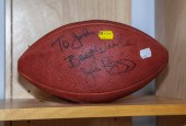 A FOOTBALL, INSCRIBED BY JOHN