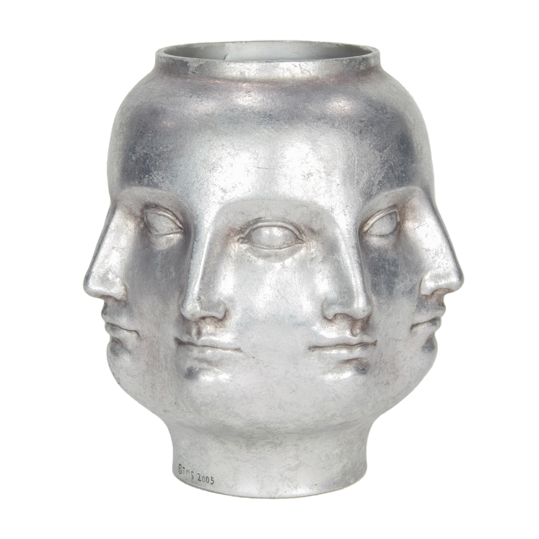 A FORNASETTI STYLE CAST METAL