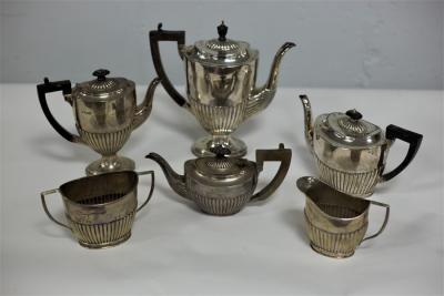 A four-piece silver tea and