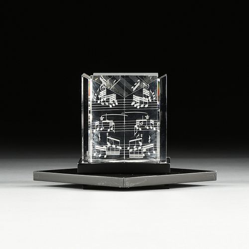 A FOUR PIECE STEUBEN CRYSTAL