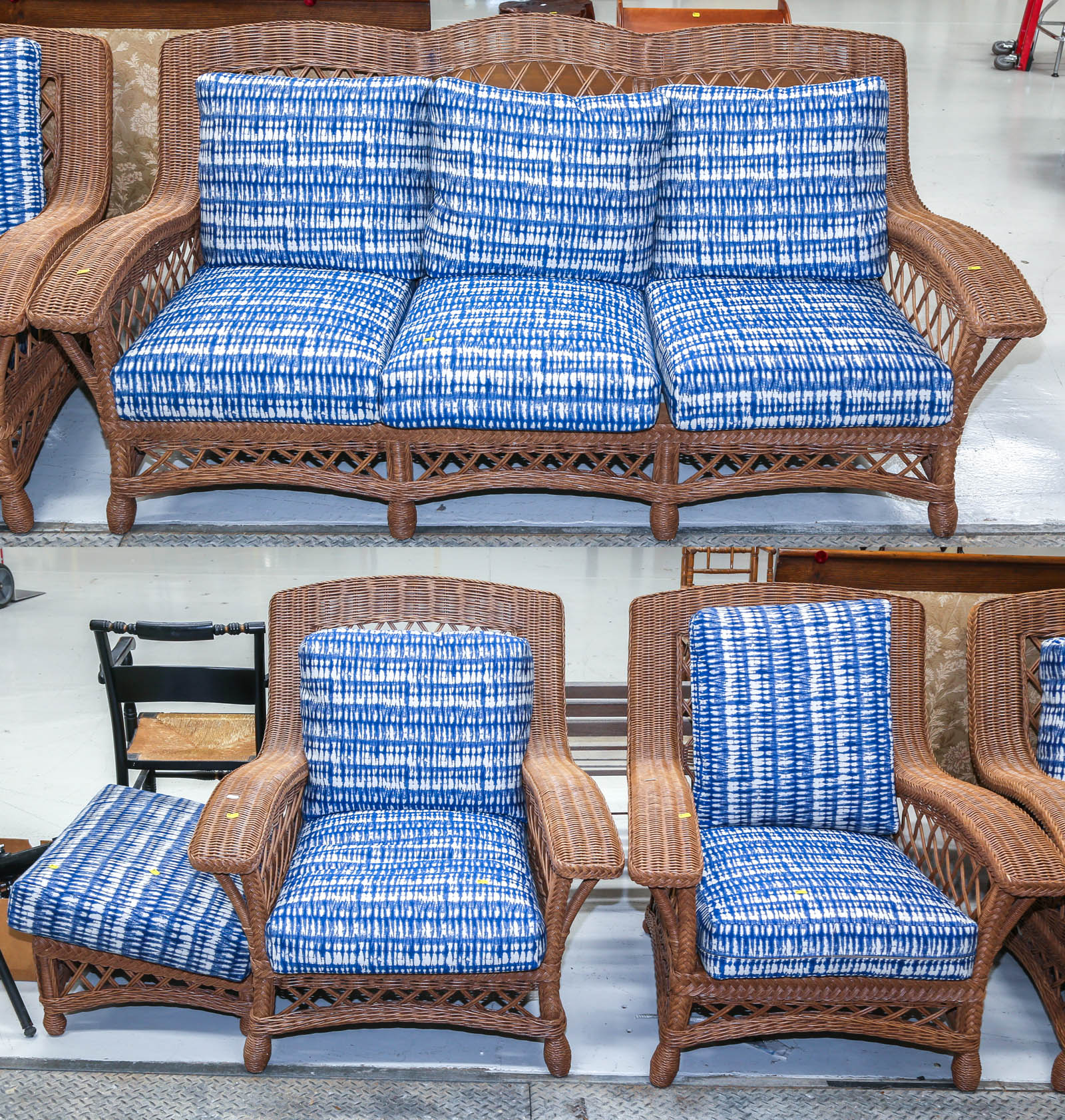 A FOUR-PIECE WICKER PATIO SET
