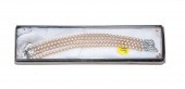 A FOUR STRAND BRACELET BY MARV