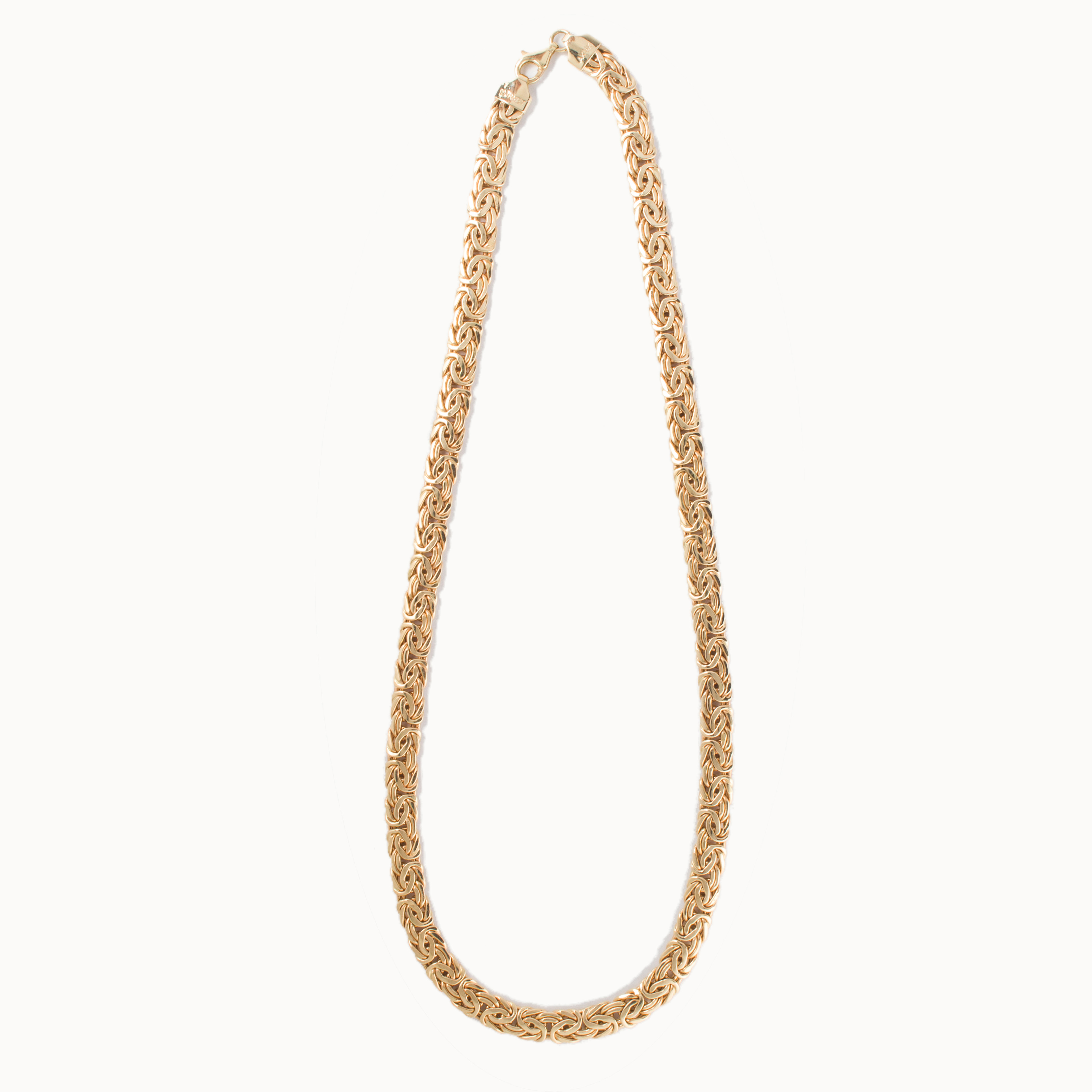 A FOURTEEN KARAT GOLD NECKLACE A