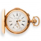 A FOURTEEN KARAT GOLD POCKET W